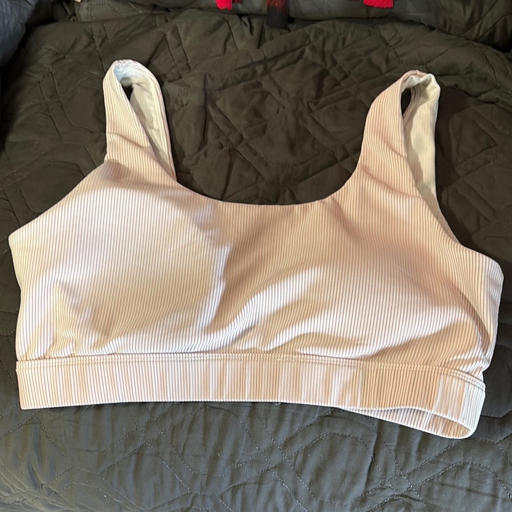 ZYIA Pink and white striped Sports Bra with Wide Straps and Seamless Design
9